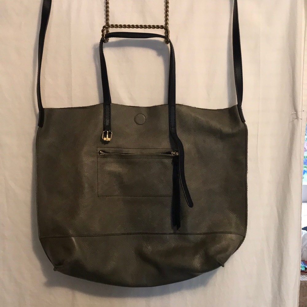 Large leather tote with both shoulder/ cross body strap and handles.